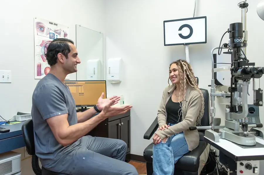 Dr. Waqar talking through exam findings with a patient in a TSO Kyle exam room